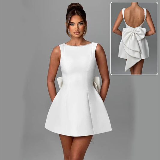 Vestido Pearl Bow Elegance – Sem Costas com Laço de Pérolas
